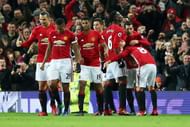 MANCHESTER, ENGLAND - DECEMBER 31:  Paul Pogba #6 of Manchester United celebrates after he scores a goal with team mates during the Premier League match between Manchester United and Middlesbrough at Old Trafford on December 31, 2016 in Manchester, England.  (Photo by Alex Livesey/Getty Images)